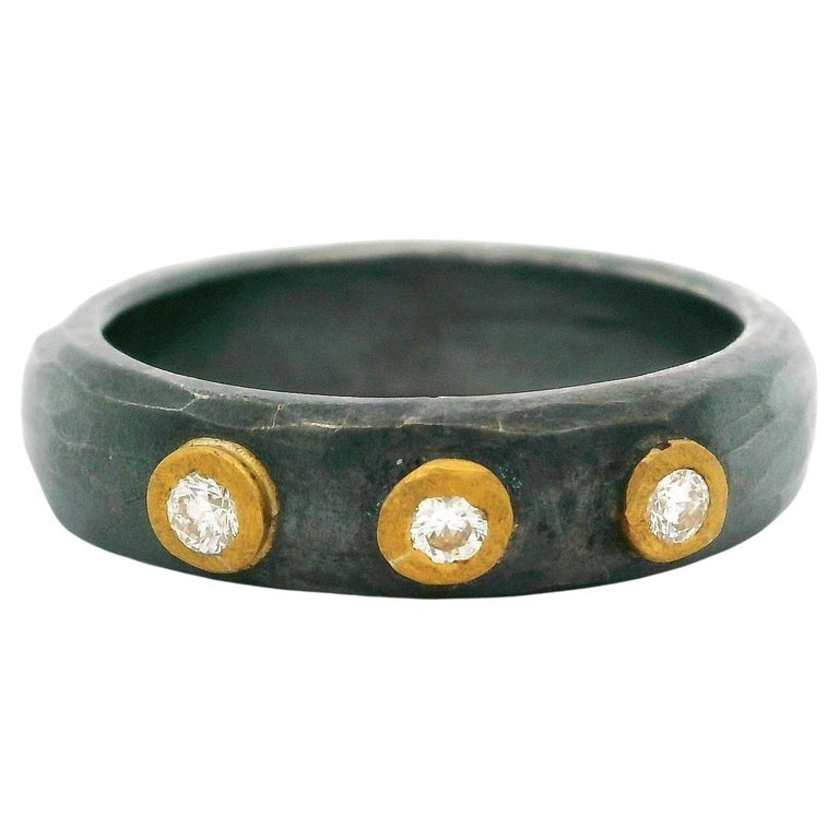 lika behar oxidized sterling silver ring with 3 diamonds and 24k gold