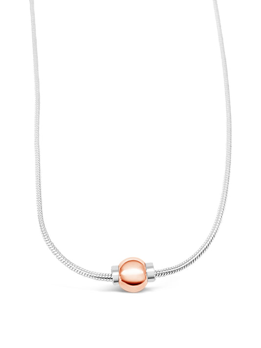 Made on Cape Cod. Beachball Necklace with a 14k rose gold beachball and 925 sterling silver chain