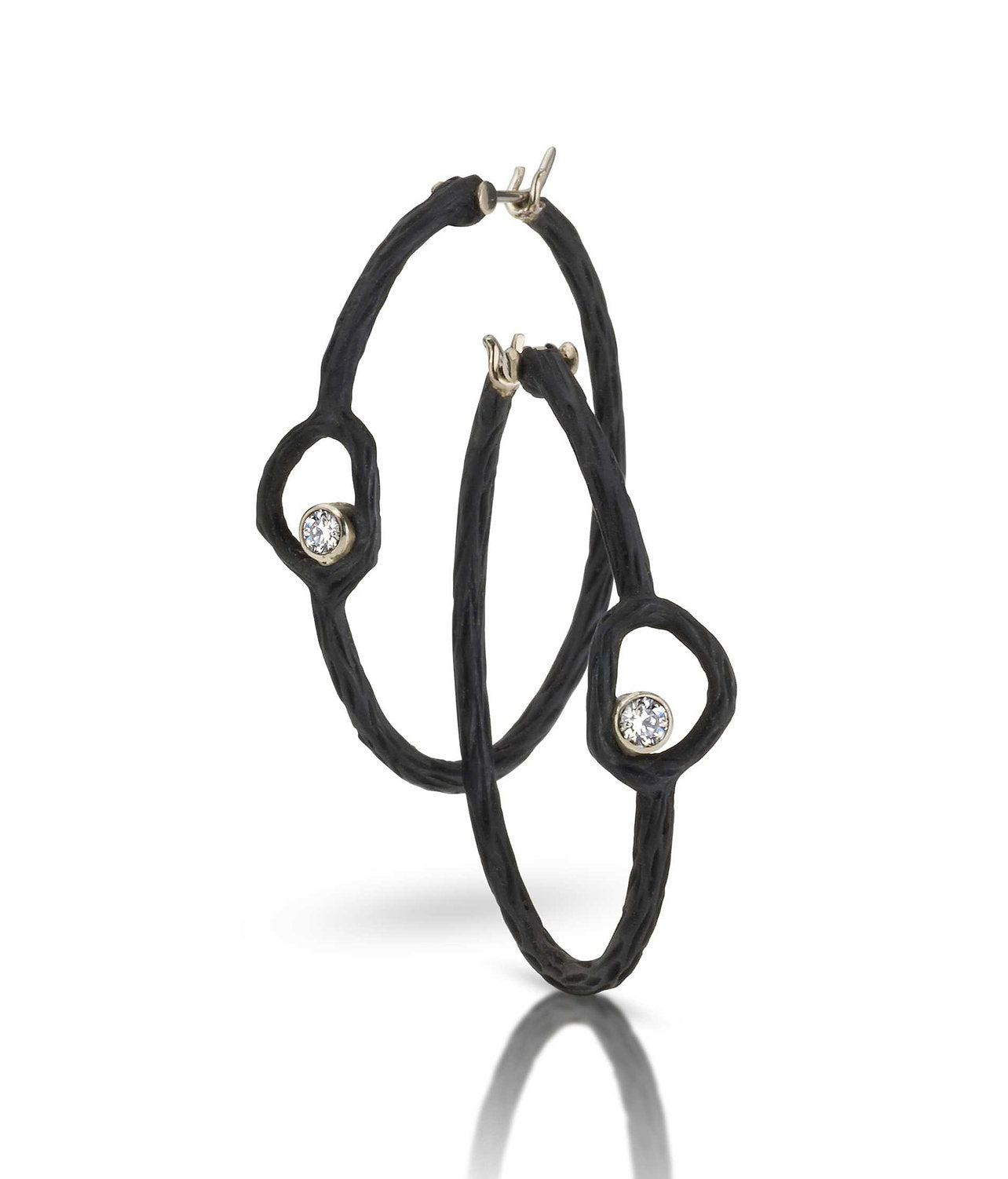 statement hoop earrings pebble diamond earrings in cobalt chrome by sarah graham