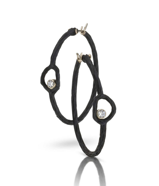 statement hoop earrings pebble diamond earrings in cobalt chrome by sarah graham